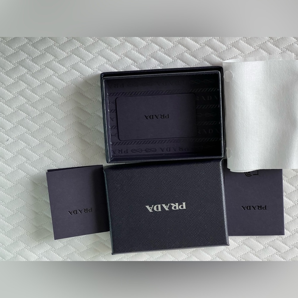 Authentic Prada card case. New never used.Certificate of authenticity included.